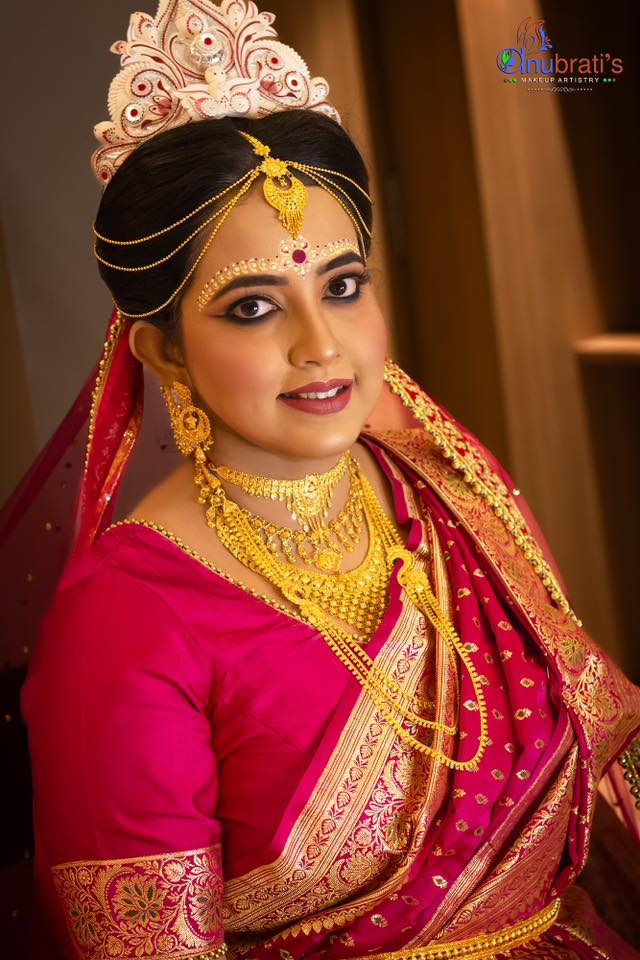 Bengali bride in 2025 pink benarasi